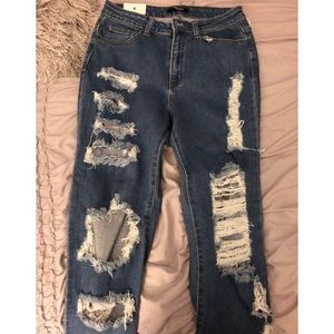Brand new! Size 9 ripped jeans